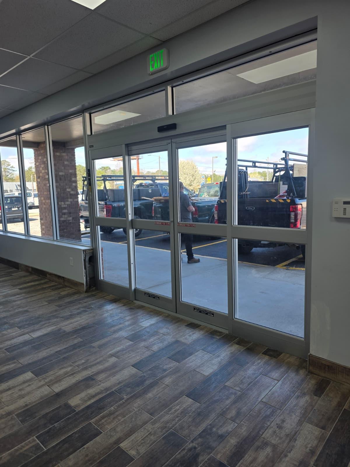 Interior view of the same automatic sliding door package, fully commissioned and tied into the storefront.