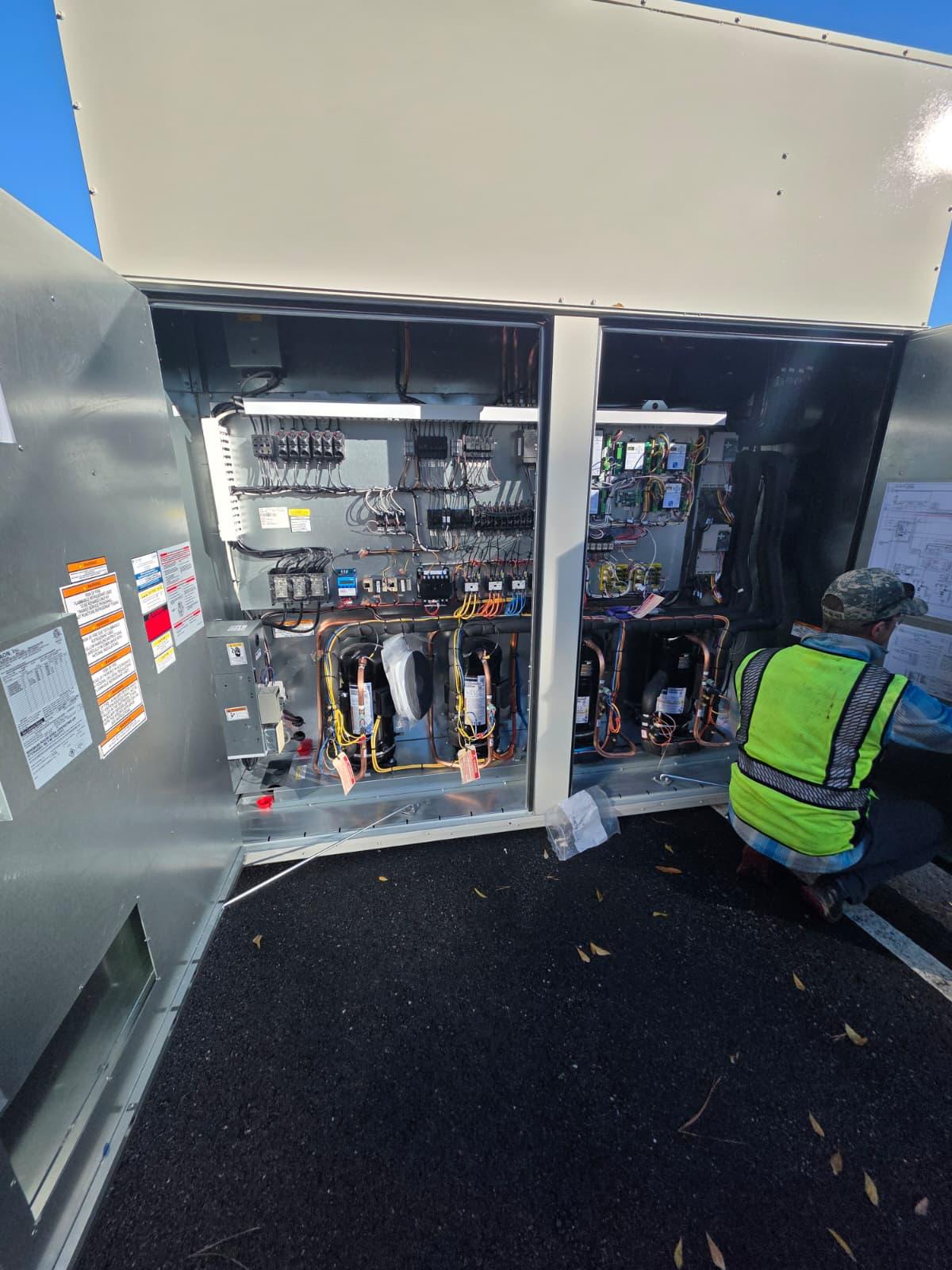 Controls and compressor cabinet wired up and commissioned on a new rooftop unit.